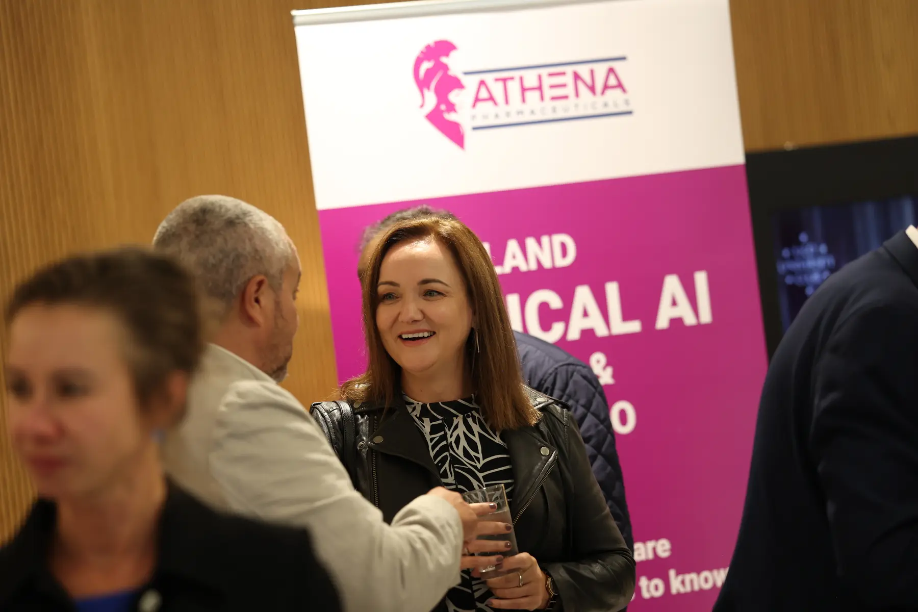 Delegates at the Athena Pharmaceuticals stand